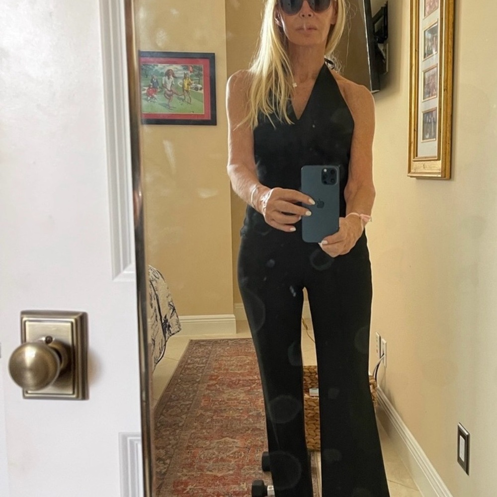 Elizabeth and James Black Pantsuit with oversized pashmina throw